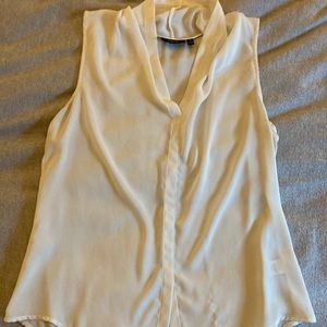 White sleeveless blouse
